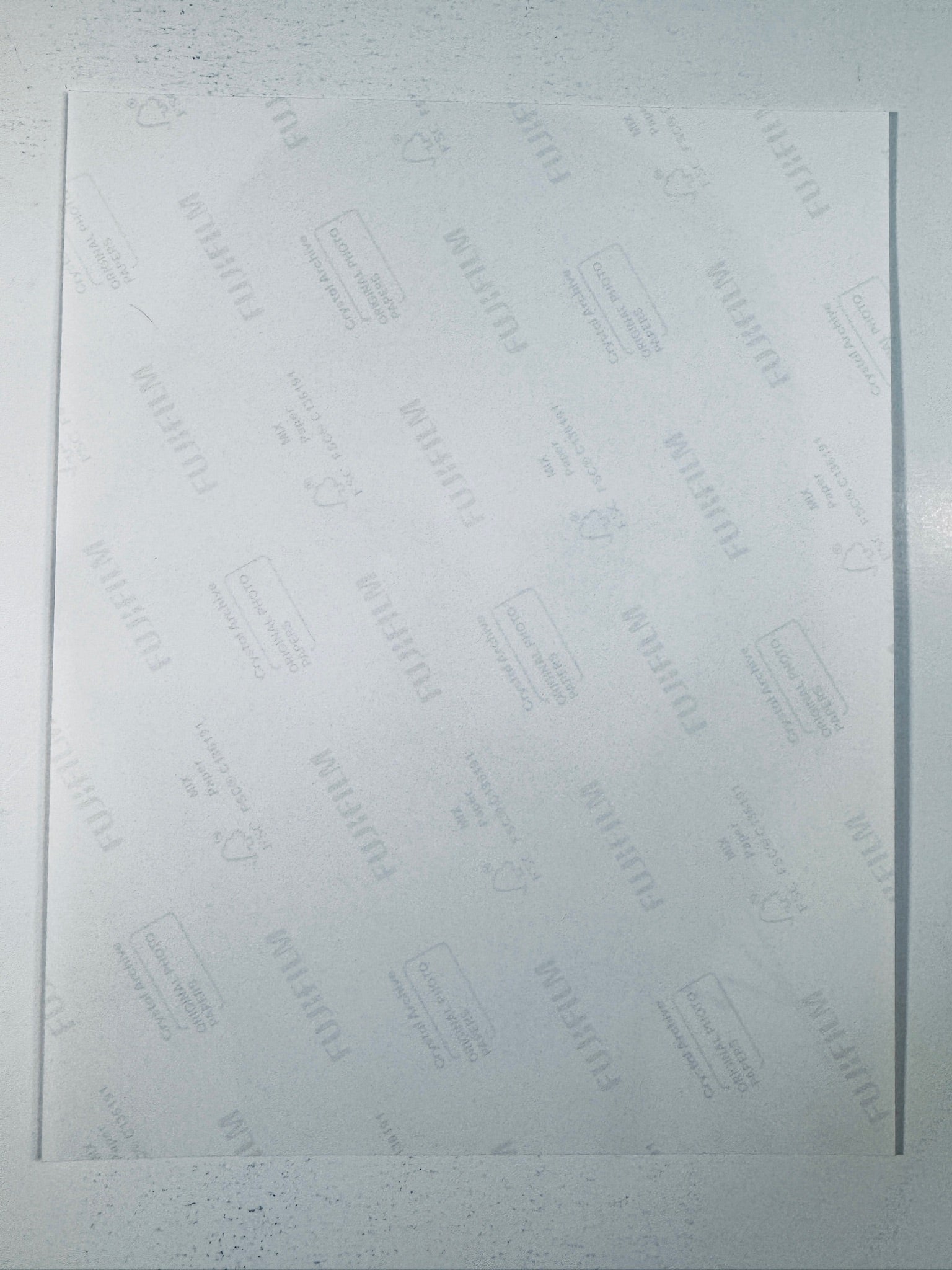 Fujifilm Crystal Archive photographic paper back surface showing the authentic backing and matte paper texture for the vintage bearded Kenny Loggins signed photo.