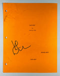 Full front view of orange The Lost Boys script cover page hand-signed by actor Kiefer Sutherland.
