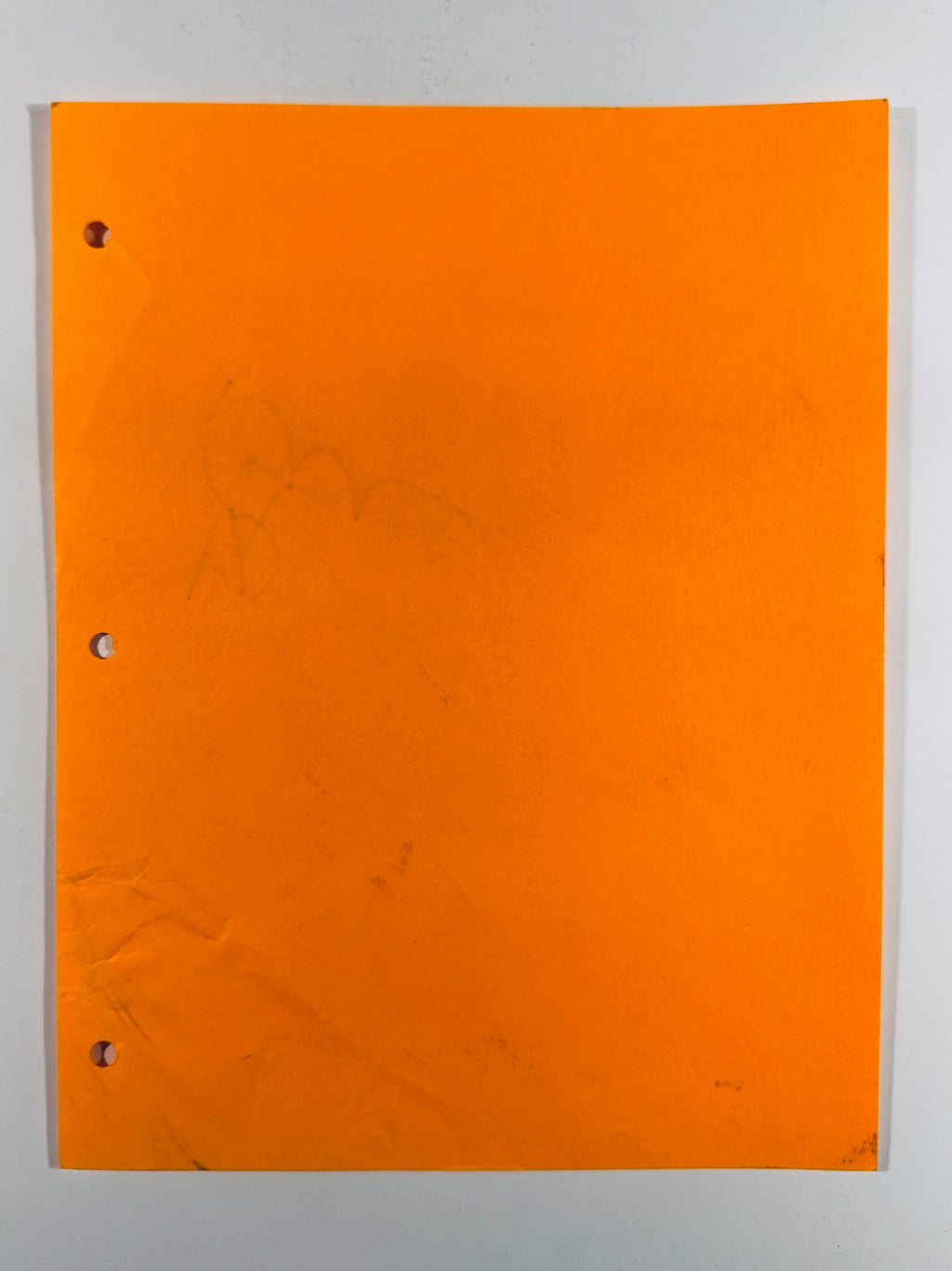Full back view of the 3-hole punched orange cardstock script cover.