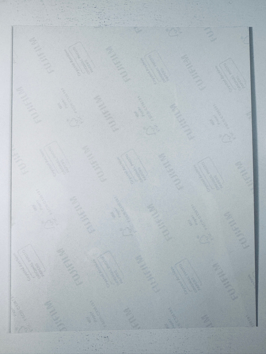 Fujifilm Crystal Archive photographic paper back surface showing the authentic backing and paper condition for the Kurt Russell signed Tombstone photo.