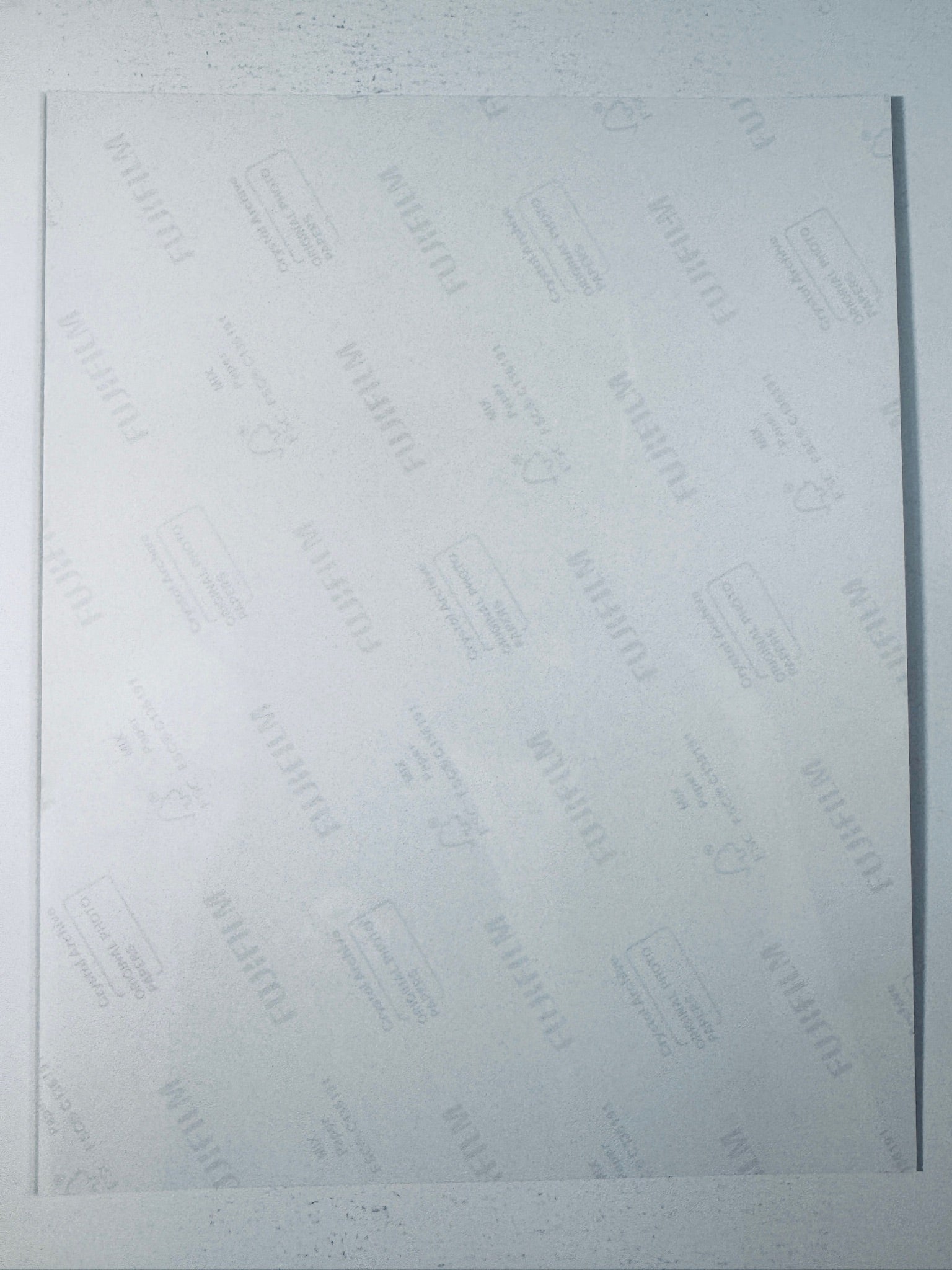 Fujifilm Crystal Archive photographic paper back surface showing the authentic backing and paper condition for the Kurt Russell signed Tombstone photo.