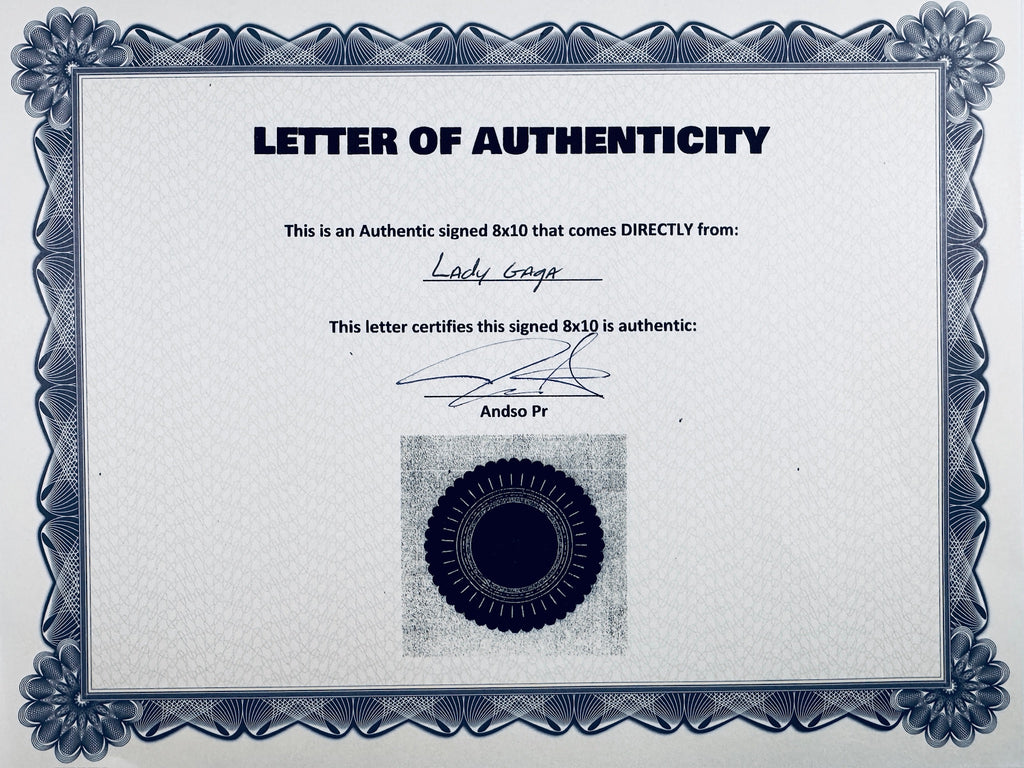 A Letter of Authenticity with a decorative blue-patterned border, certifying an authentic signed 8x10 coming directly from Lady Gaga, featuring a dark circular seal graphic at the bottom.