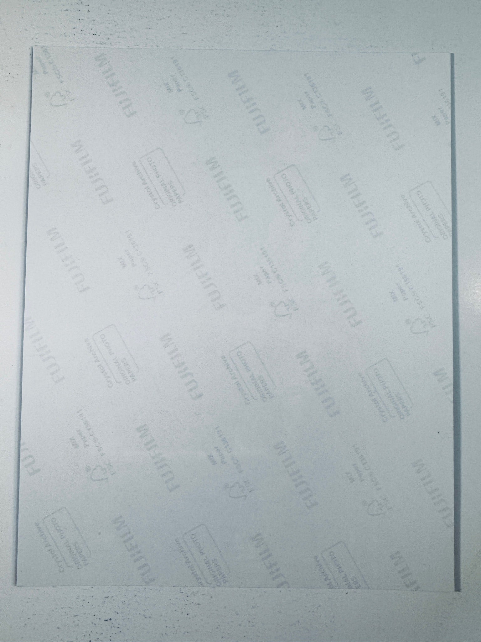 Fujifilm Crystal Archive photographic paper back surface showing the authentic backing and matte paper texture for the Lindsay Lohan signed photo.