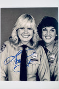 Signed 8x10 matte promotional photo of actress Loretta Swit as Detective Chris Cagney from Cagney & Lacey in a police uniform, featuring a bold blue ink autograph.