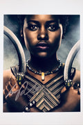 Lupita Nyong'o hand-signed 8x10 portrait photo as Nakia, holding her ring-blades, from the movie Black Panther.