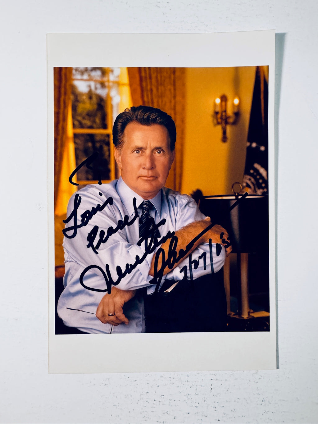 Autographed promotional portrait photo signed by Martin Sheen as President Jed Bartlet in The West Wing with inscription and date.