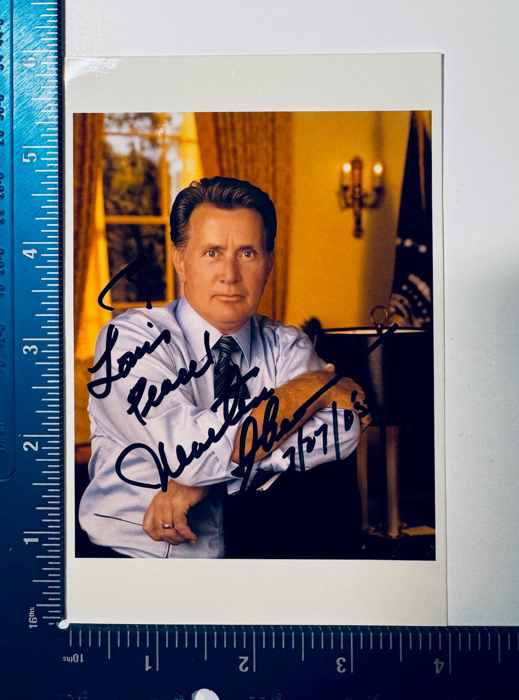 Autographed Martin Sheen signed portrait as President Jed Bartlet in The West Wing displayed next to a ruler for size measurement.