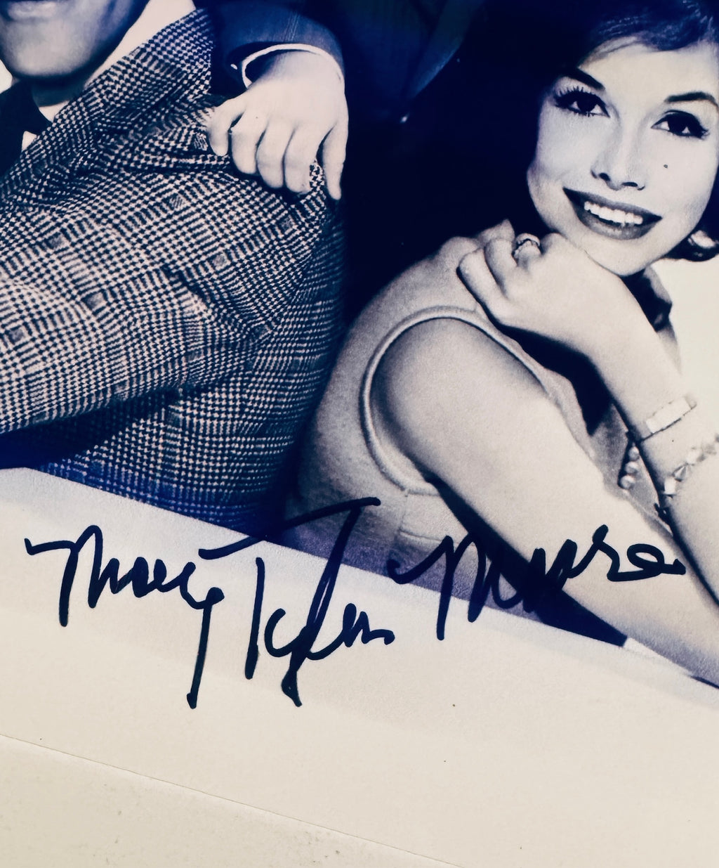 Close-up view of Mary Tyler Moore signature in black marker across the bottom.
