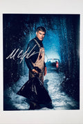 Michael C. Hall hand-signed 8x10 matte photo as Dexter Morgan in Dexter: New Blood holding a trash bag in the snow.