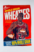 Michael Jordan signed Wheaties cereal box panel featuring him in a red Chicago Bulls number 23 jersey with a black autograph across the front.