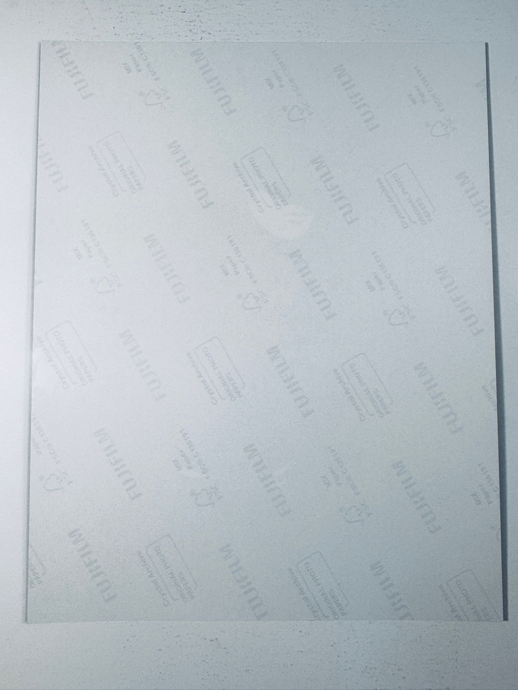 Back of the Fujifilm photographic paper showing the reverse side condition and paper branding for the Michael Keaton signed Batman collectible.