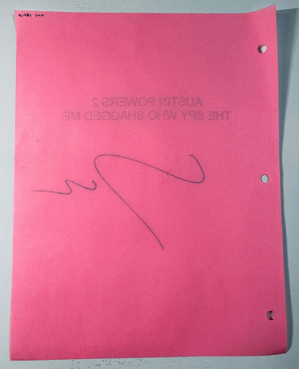 Reverse side of the signed pink script cover showing light pencil notation of Michael York in top corner.