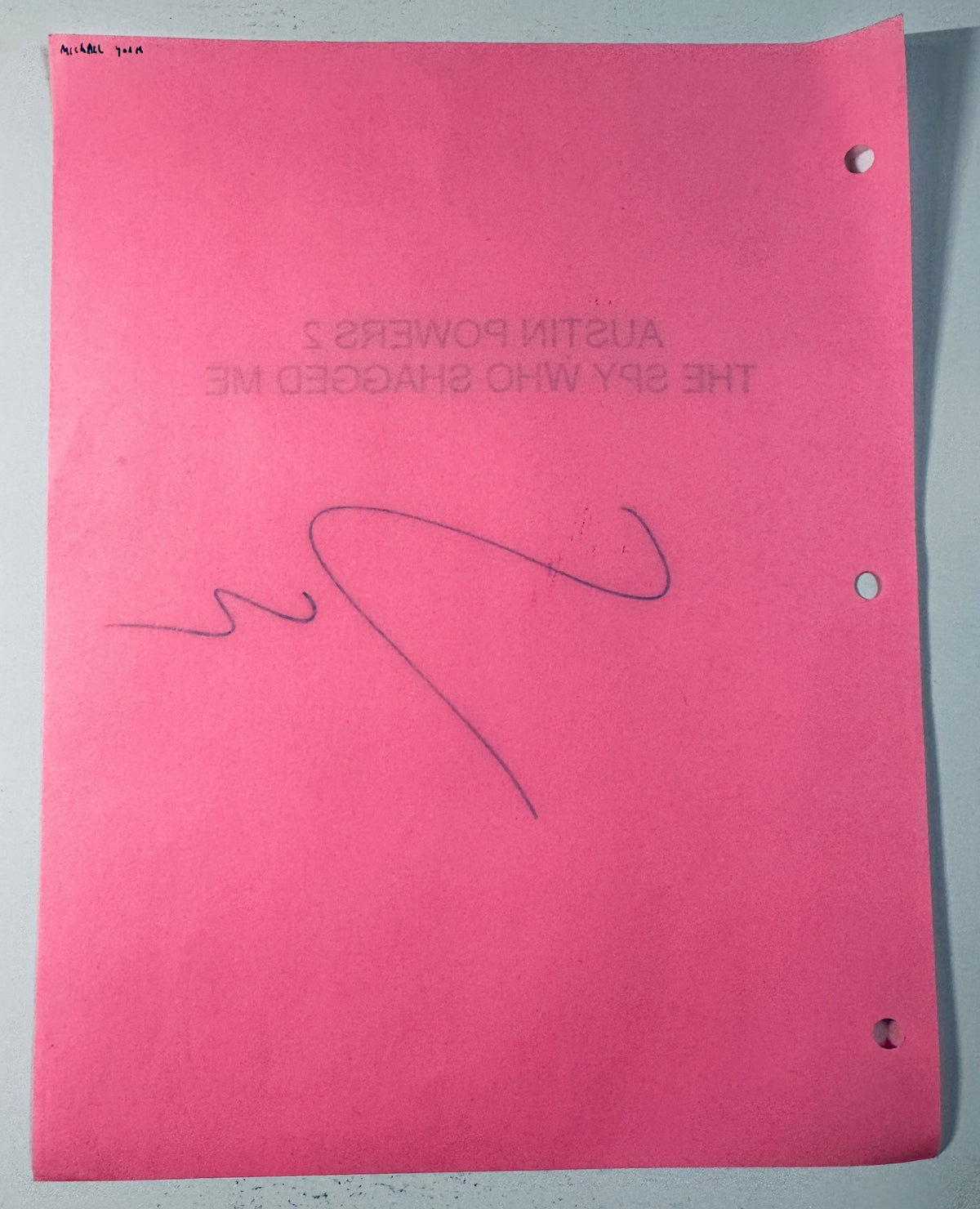 Reverse side of the signed pink script cover showing light pencil notation of Michael York in top corner.