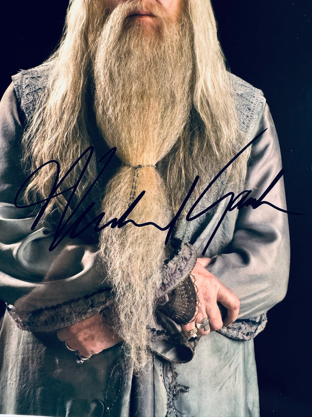 Closeup of Michael Gambon autograph on Harry Potter Albus Dumbledore signed 8x10 photo