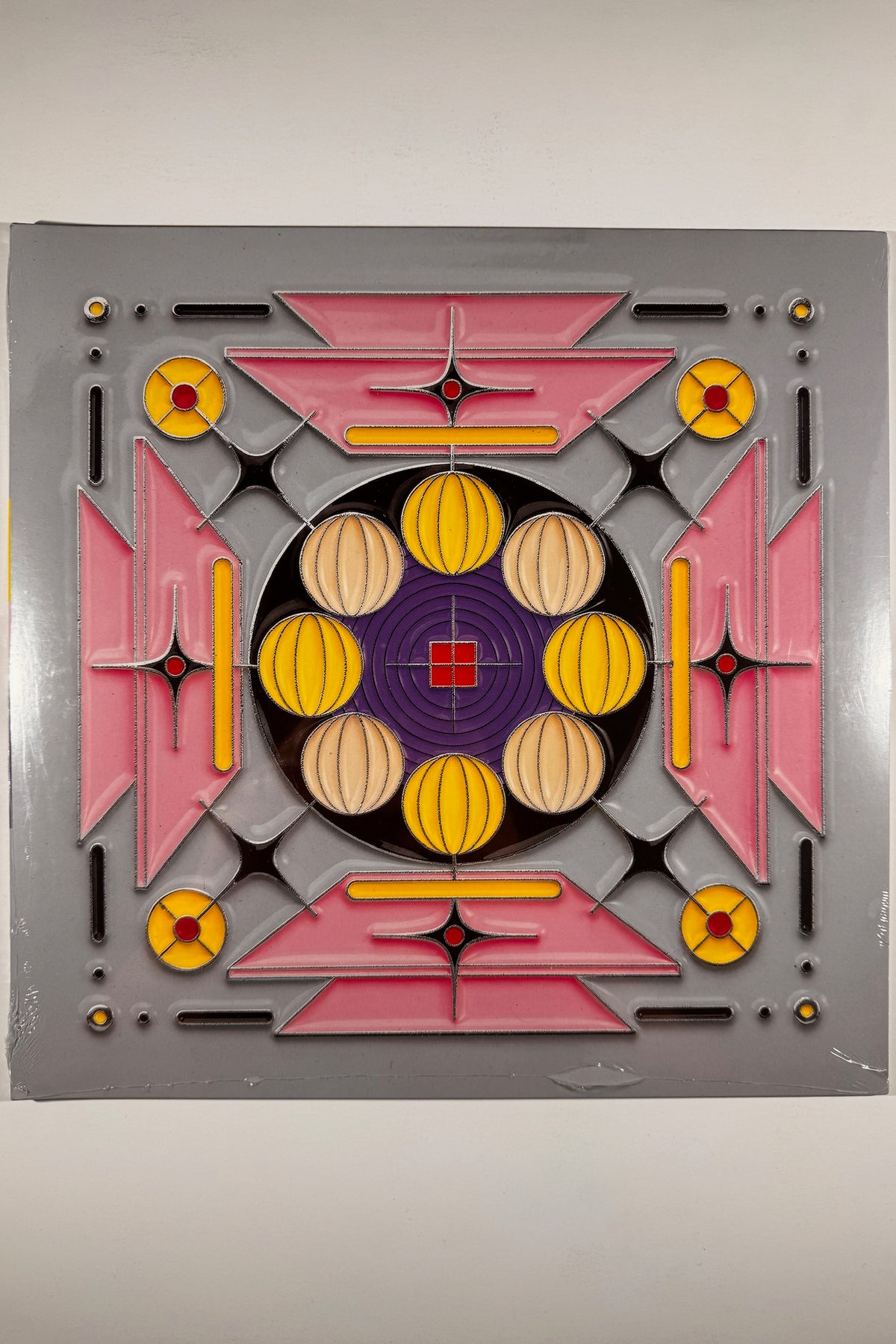 Full view of geometric artwork front cover for Mike D Thank You vinyl record with signed insert.