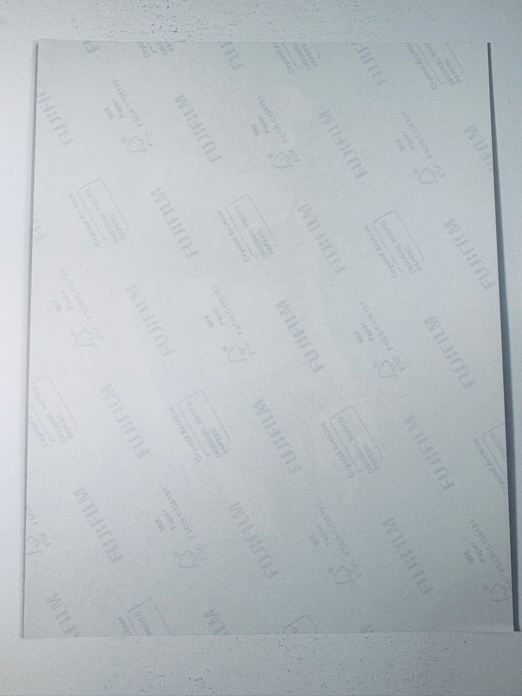 Back of the Fujifilm photographic paper showing the reverse side condition and paper branding for the Miranda Kerr signed collectible.