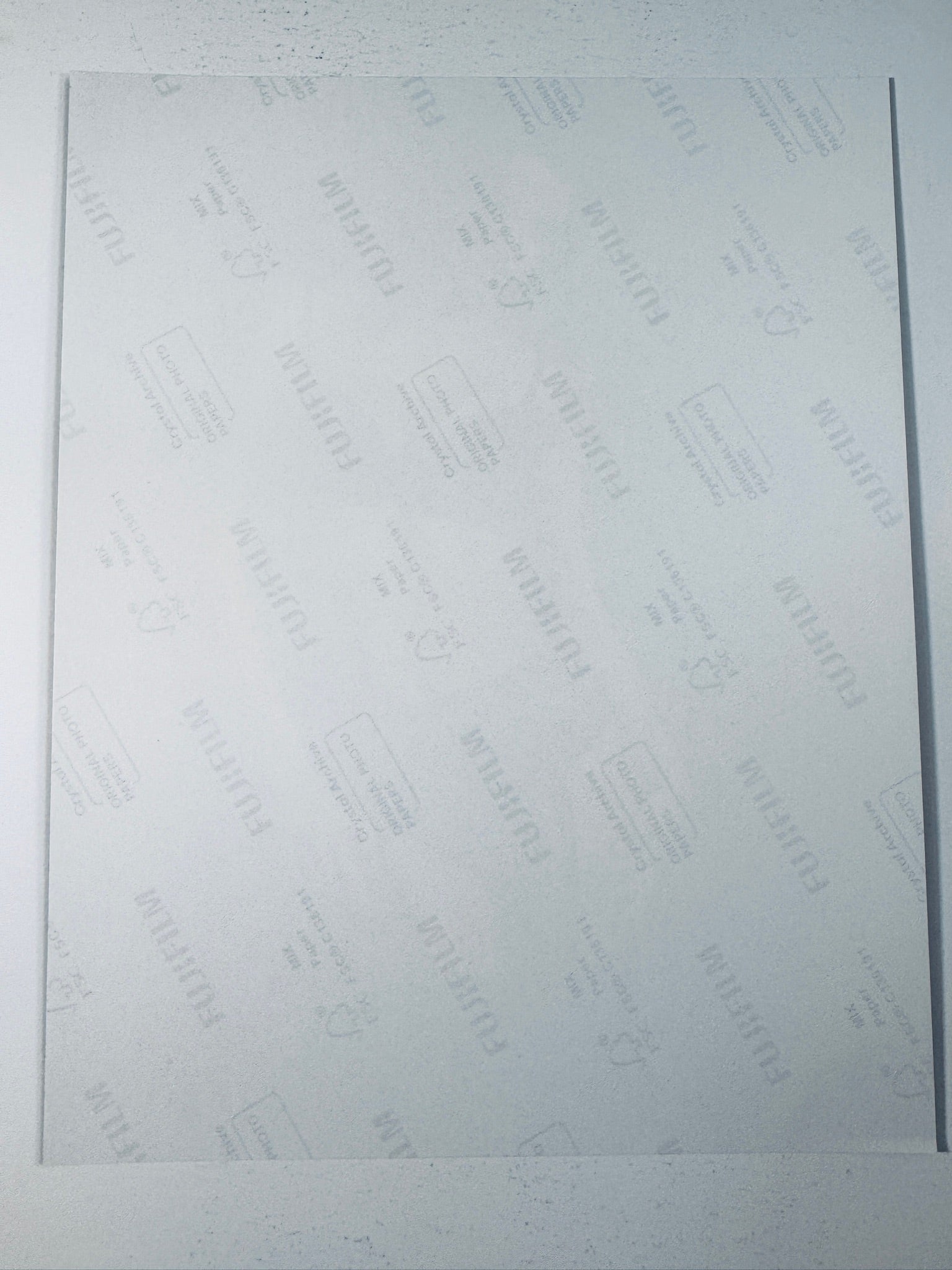Back of the Fujifilm photographic paper showing the reverse side condition and paper branding for the Miranda Kerr signed collectible.
