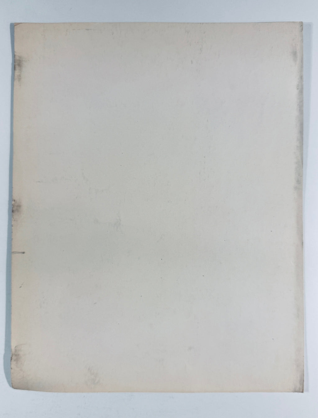 Full back view of blank off-white backing on vintage Muhammad Ali autographed photo.