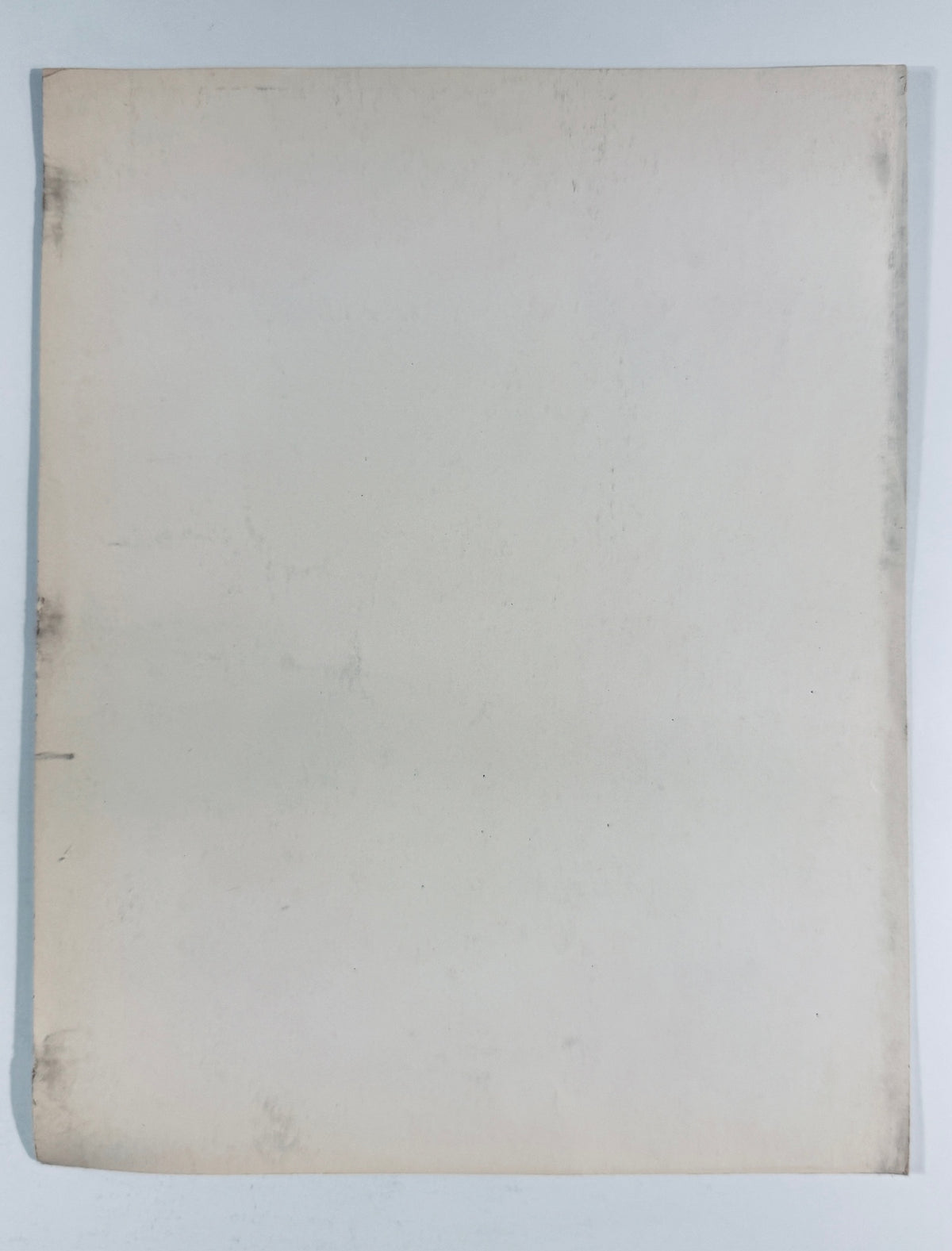 Full back view of blank off-white backing on vintage Muhammad Ali autographed photo.