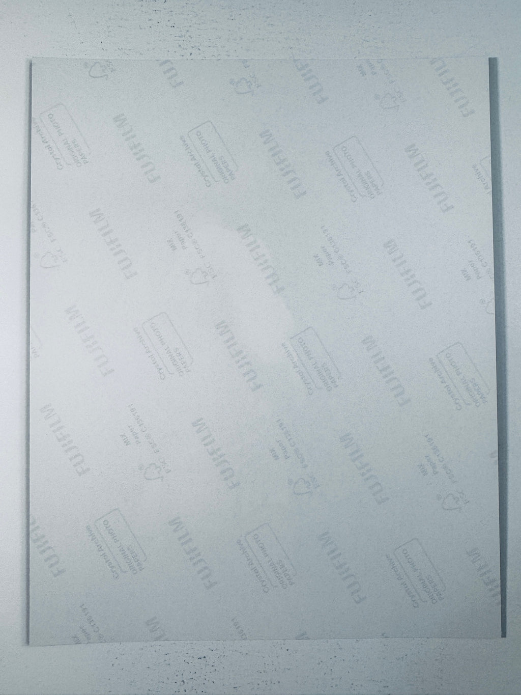 Fujifilm Crystal Archive photographic paper back surface showing the authentic backing and matte paper texture for the Nadia Comaneci signed photo.