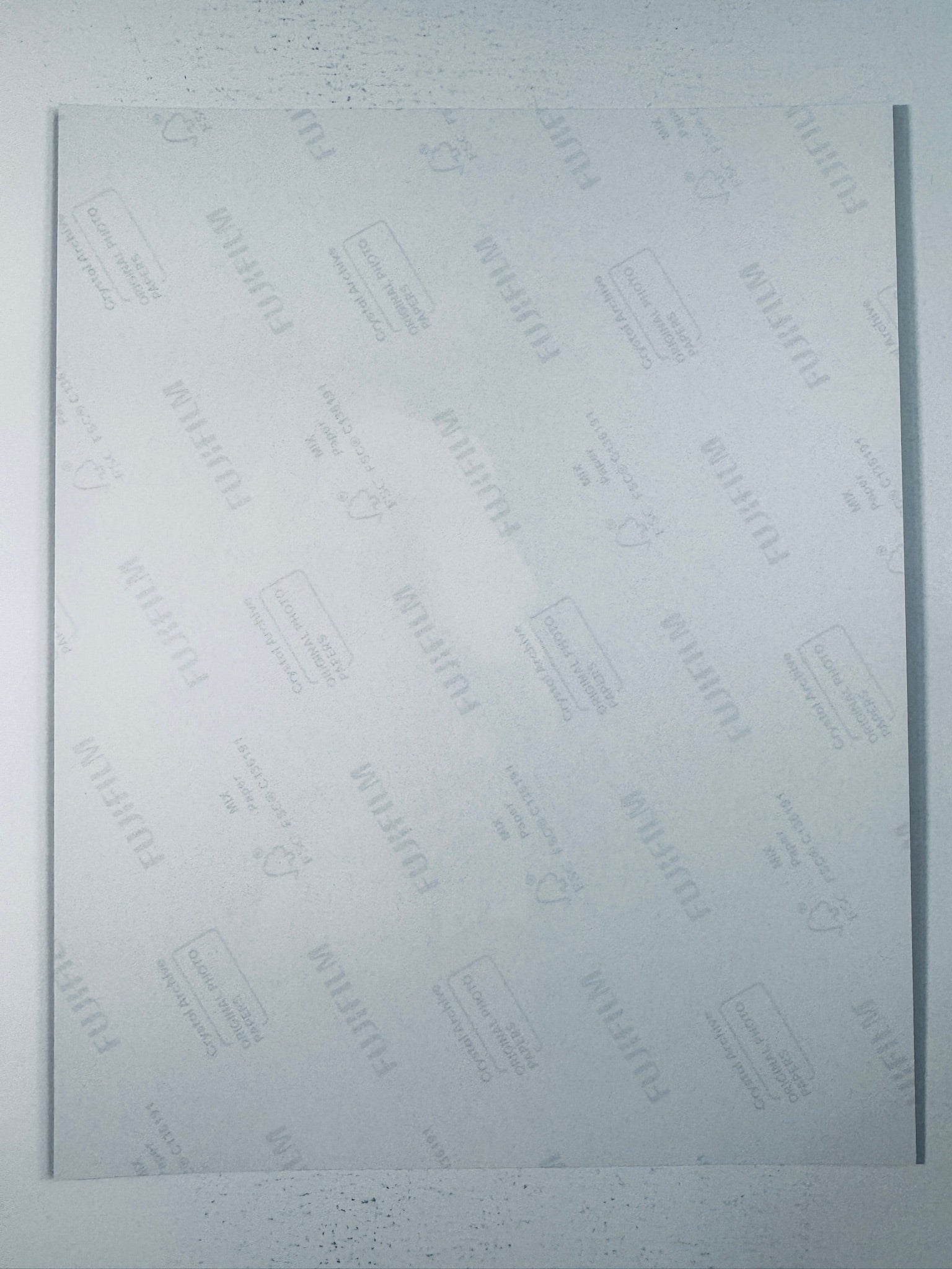 Fujifilm Crystal Archive photographic paper back surface showing the authentic backing and matte paper texture for the Nadia Comaneci signed photo.