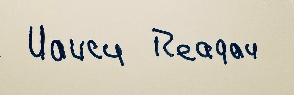 Close-up macro detail of First Lady Nancy Reagan signature in dark ink.