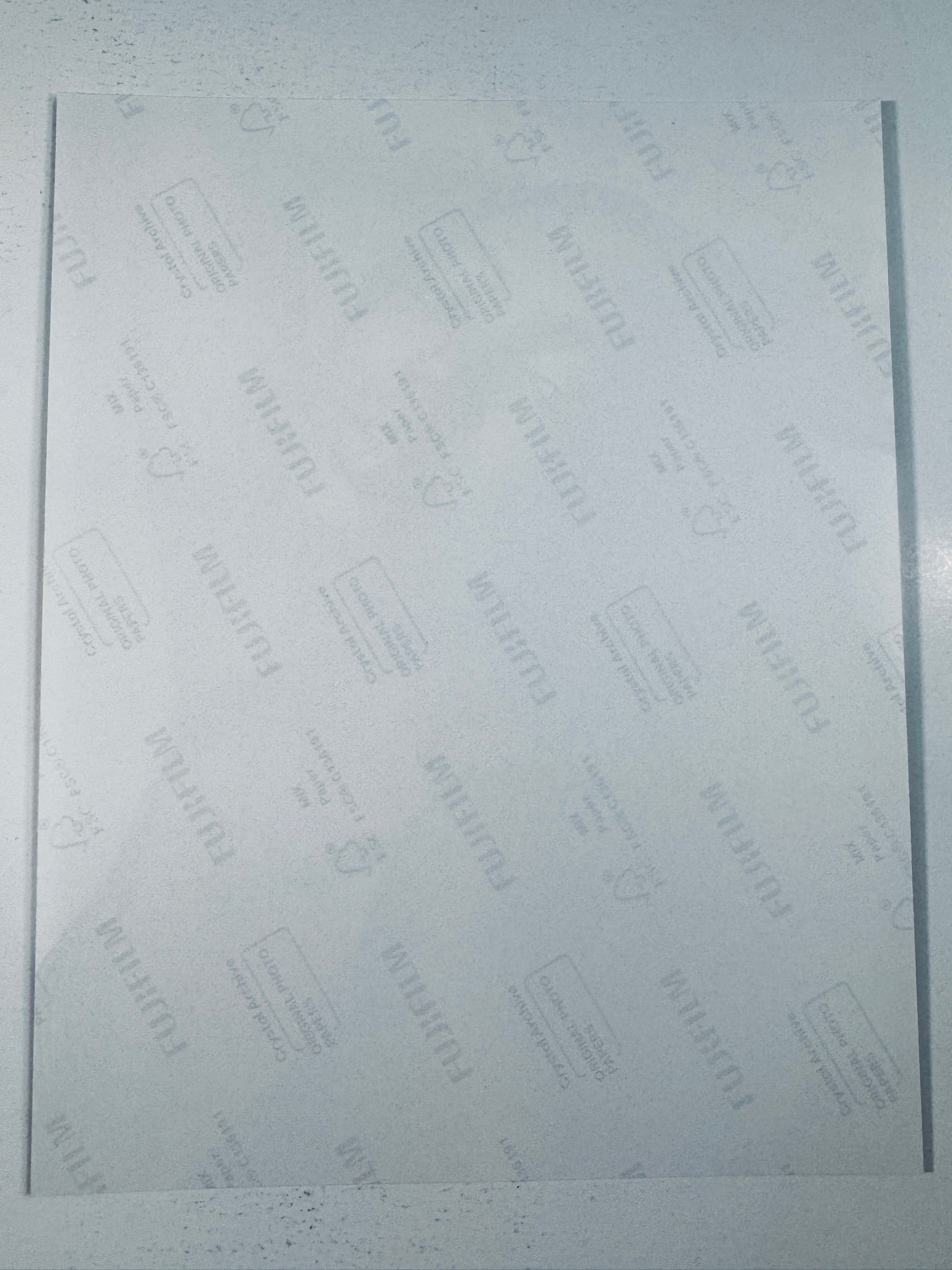 Fujifilm Crystal Archive photographic paper back surface showing the authentic backing and matte paper texture for the Naomi Campbell signed photo.