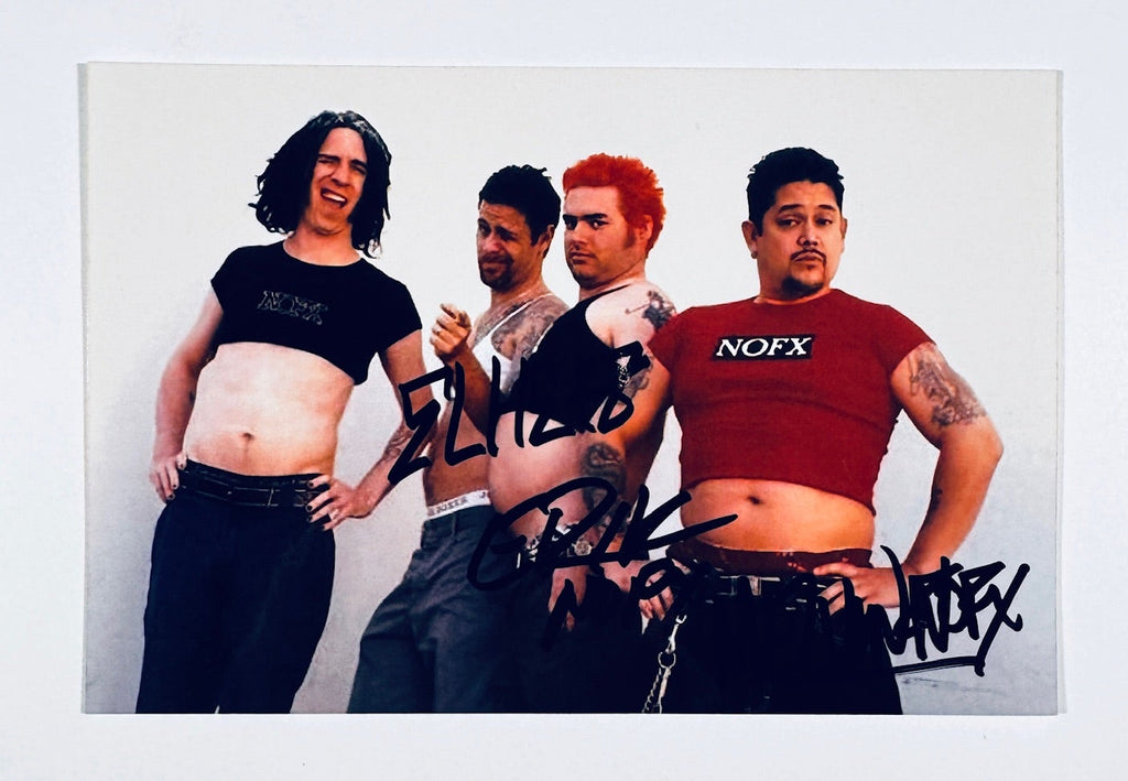 Autographed 5x7 color promotional photograph of punk rock band NOFX wearing crop top t-shirts, signed in black marker by band members.