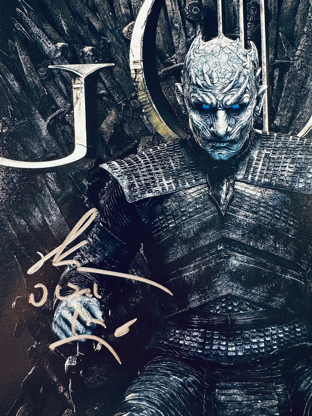 Close-up view of Richard Brake's signature in silver marker on the Game of Thrones Night King promotional matte photo.