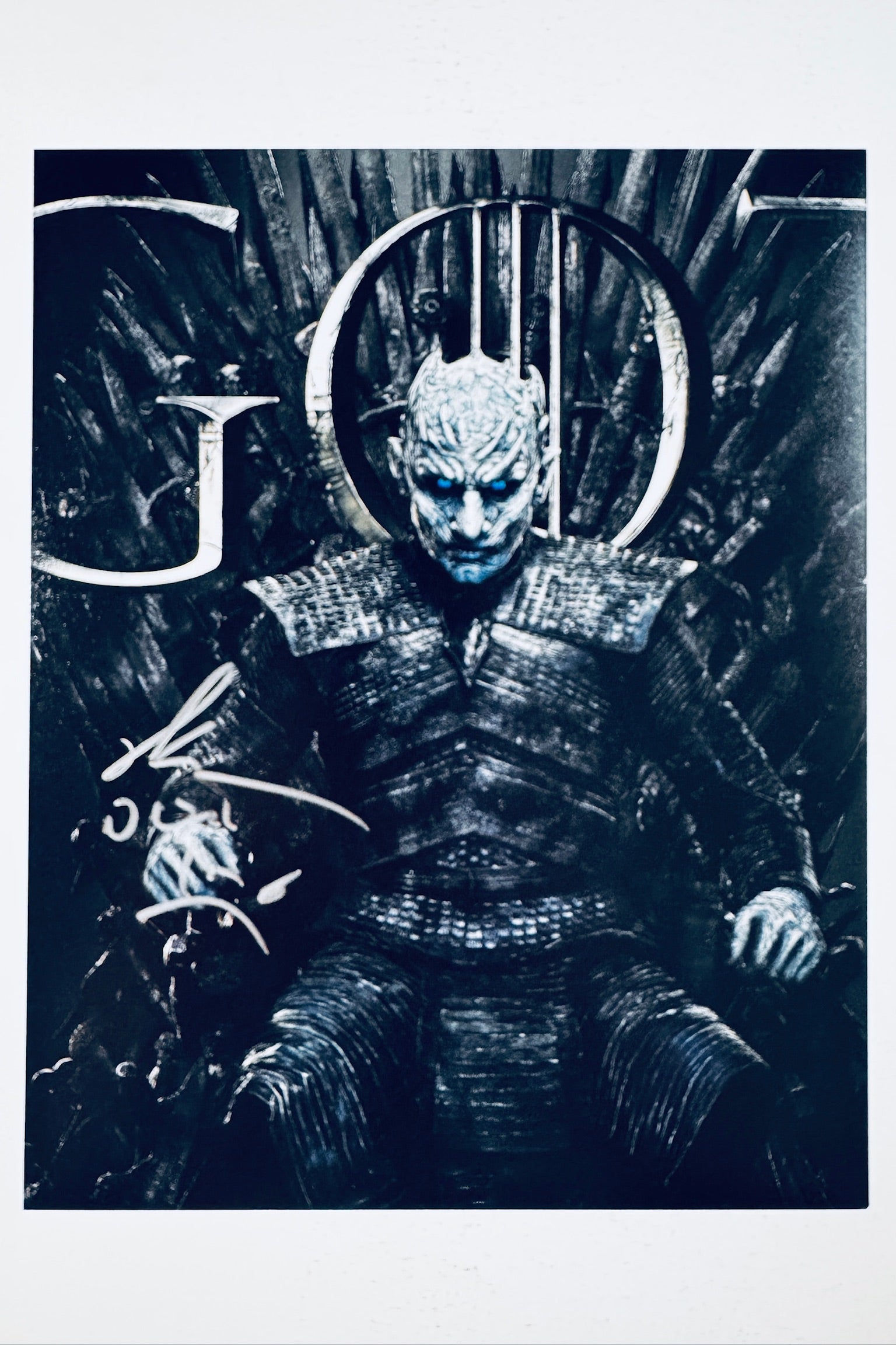 Signed 8x10 matte photo of Richard Brake as The Night King sitting on the Iron Throne from Game of Thrones, featuring a bold silver ink autograph.