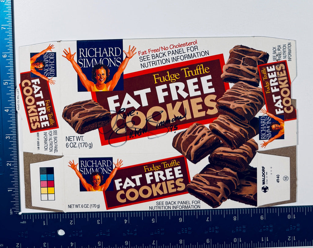 Autographed Richard Simmons signed Fudge Truffle Fat Free Cookies flattened box shown next to a measuring ruler.