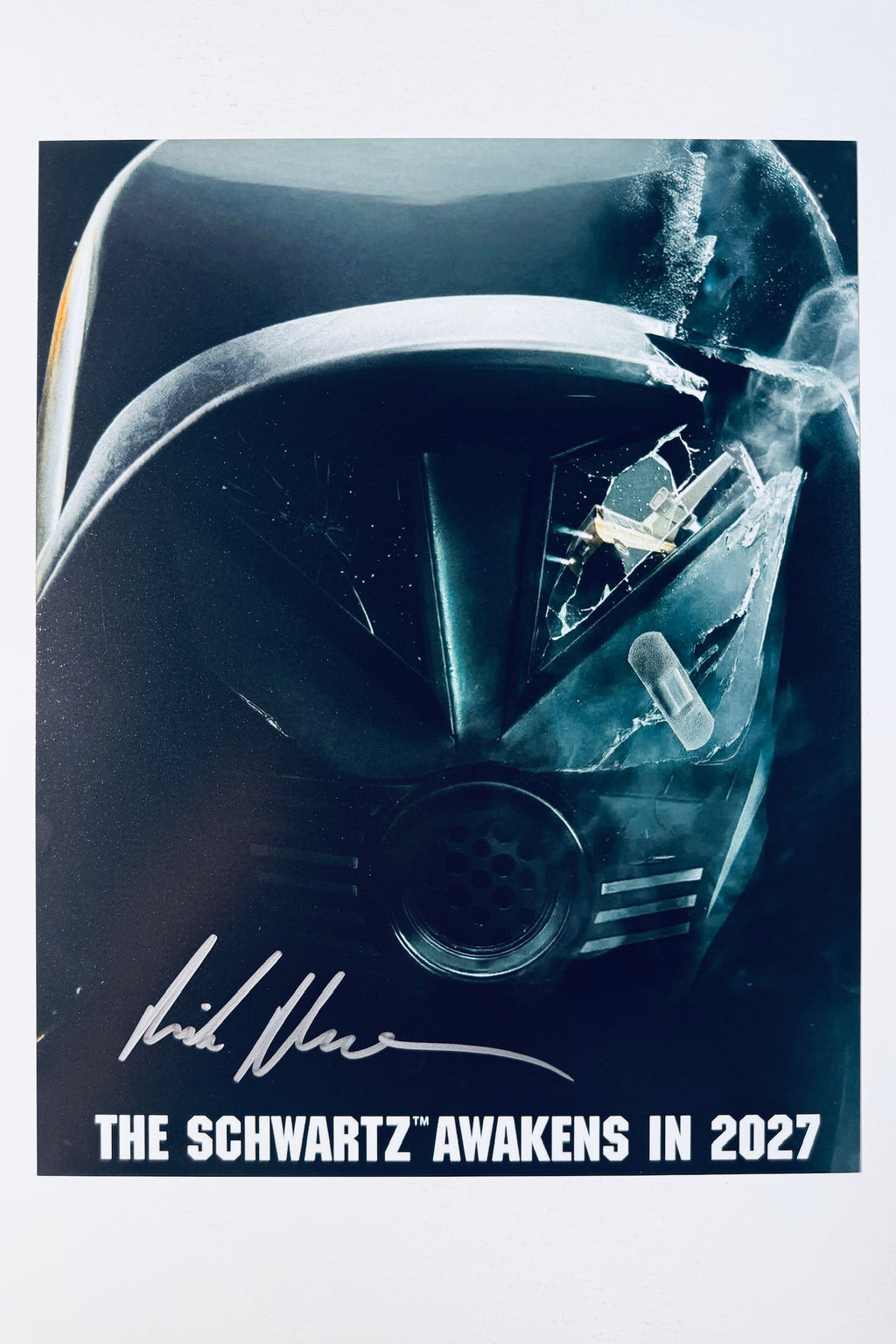 Rick Moranis hand-signed 8x10 matte photo featuring Dark Helmet from the upcoming Spaceballs sequel, Spaceballs: The New One, with the tagline The Schwartz Awakens in 2027.