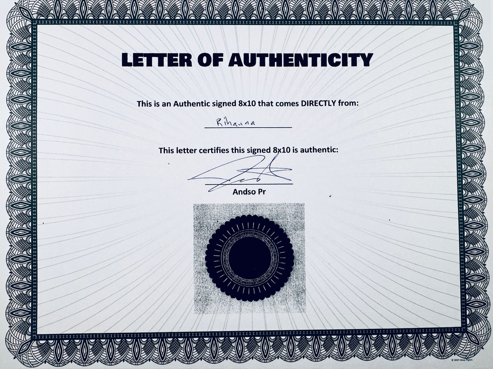 A Letter of Authenticity with a decorative blue-patterned border, certifying an authentic signed 8x10 coming directly from Rihanna, featuring a dark circular seal graphic at the bottom.