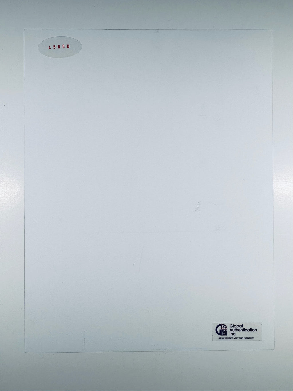 Reverse side of River Phoenix autographed 8x10 photo showing Global Authentication Inc (GAI) sticker and serial number 45850.