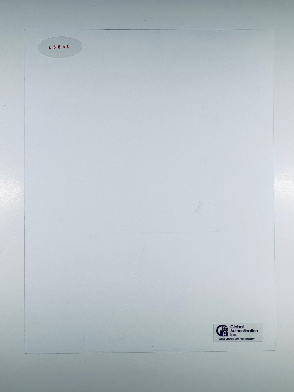 Reverse side of River Phoenix autographed 8x10 photo showing Global Authentication Inc (GAI) sticker and serial number 45850.