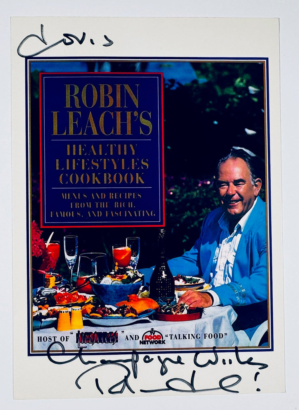 Full front view of autographed Robin Leach's Healthy Lifestyles Cookbook promo card with signature and inscription.