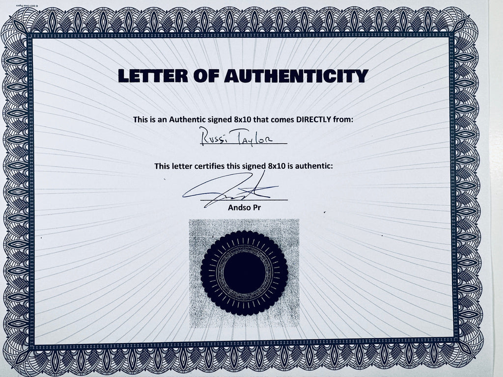 A Letter of Authenticity with a decorative blue-patterned border, certifying an authentic signed 8x10 coming directly from Russi Taylor, featuring a dark circular seal graphic at the bottom.