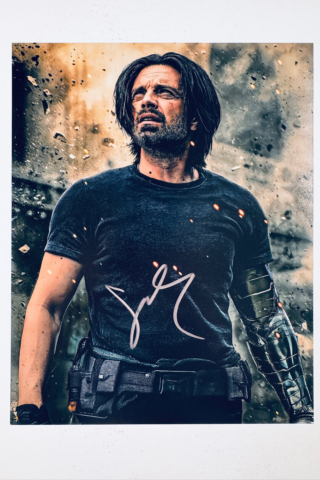 Signed 8x10 matte photo of Sebastian Stan as Bucky Barnes / The Winter Soldier from Marvel's The Falcon and the Winter Soldier, featuring a bold silver ink autograph.