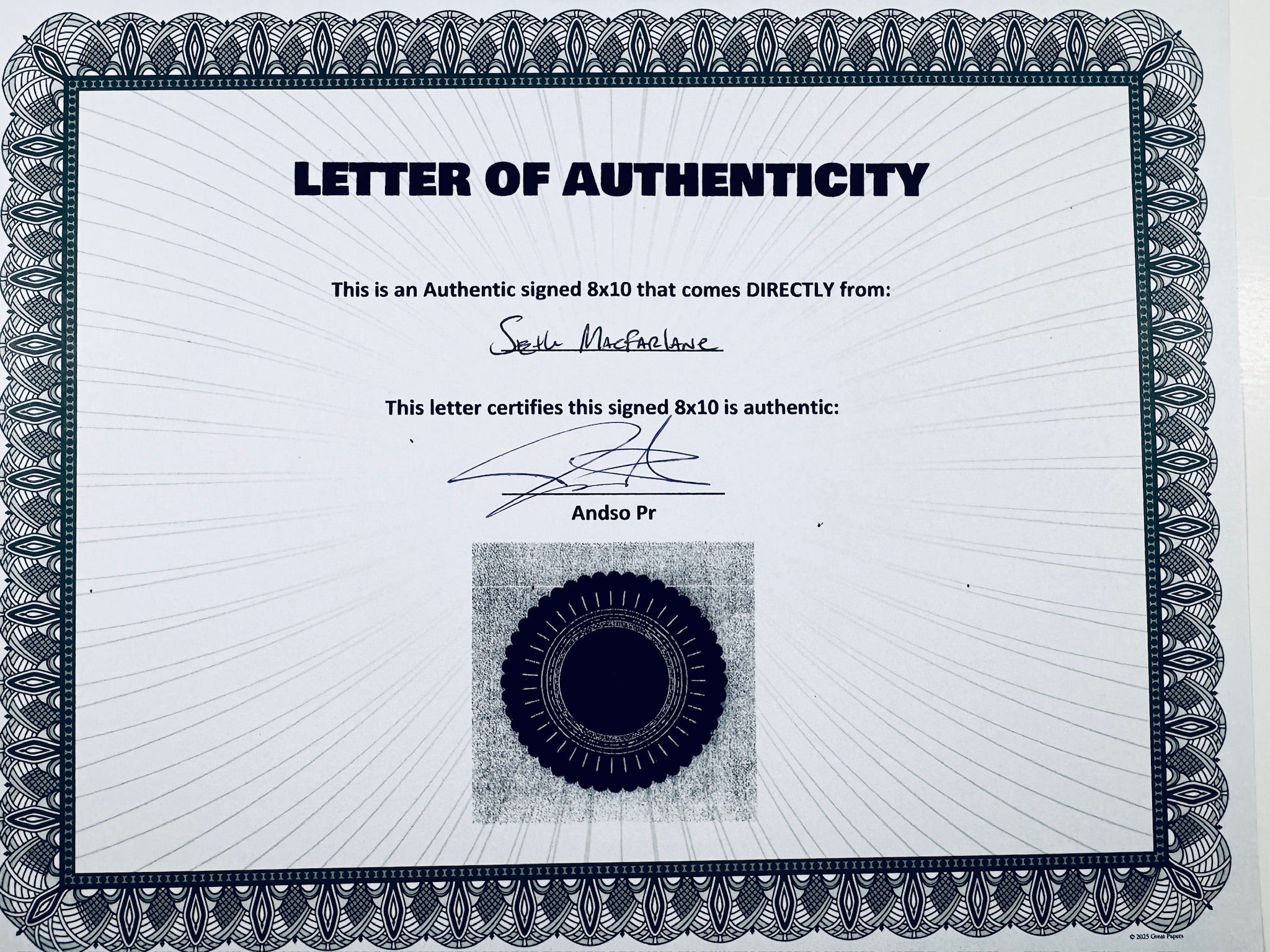 A Letter of Authenticity with a decorative blue-patterned border, certifying an authentic signed 8x10 coming directly from Seth MacFarlane, featuring a dark circular seal graphic at the bottom.