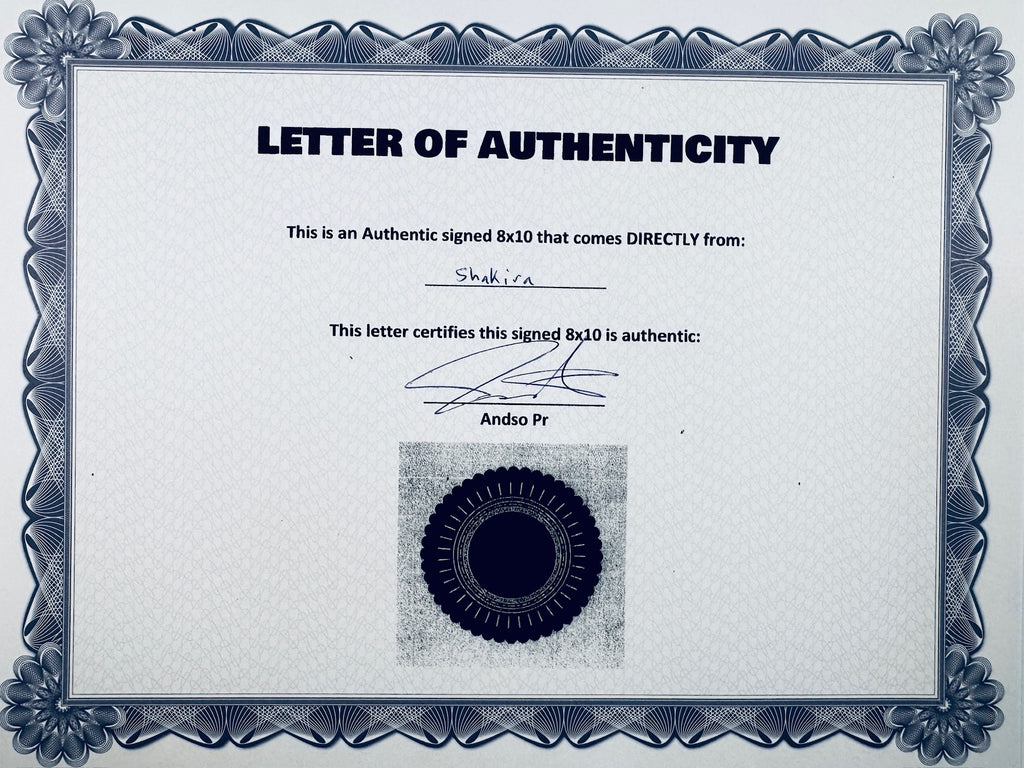 A Letter of Authenticity with a decorative blue-patterned border, certifying an authentic signed 8x10 coming directly from Shakira, featuring a dark circular seal graphic at the bottom.