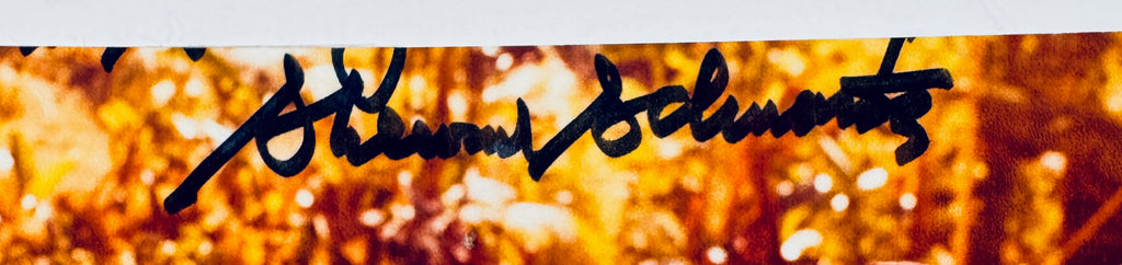 Macro close-up detail of Sherwood Schwartz's signature in black marker.