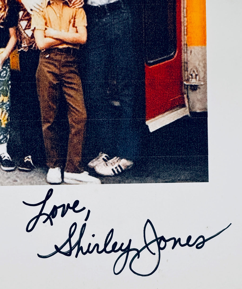 Close-up view of Shirley Jones' handwritten inscription Love, Shirley Jones signed in black pen.
