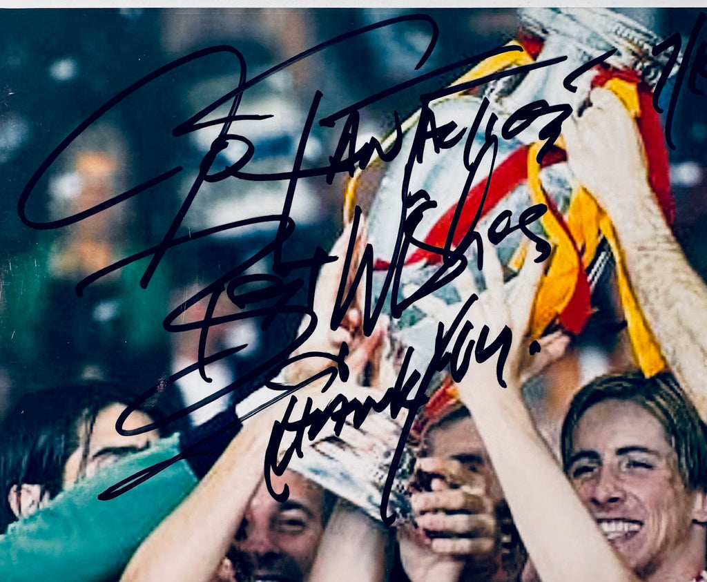 Close-up view of the upper section showing hand-written inscriptions near the UEFA Euro trophy.