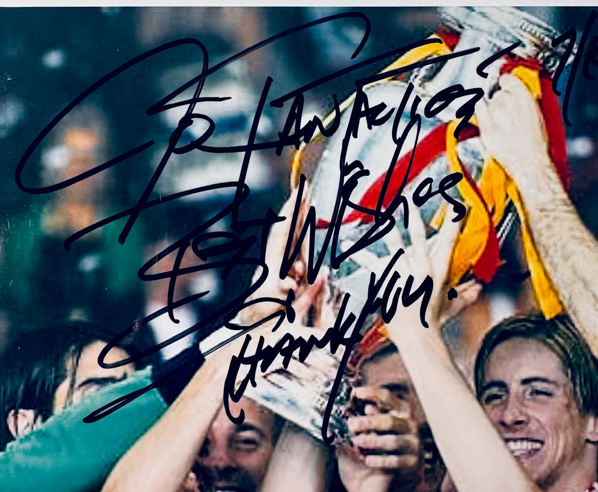 Close-up view of the upper section showing hand-written inscriptions near the UEFA Euro trophy.