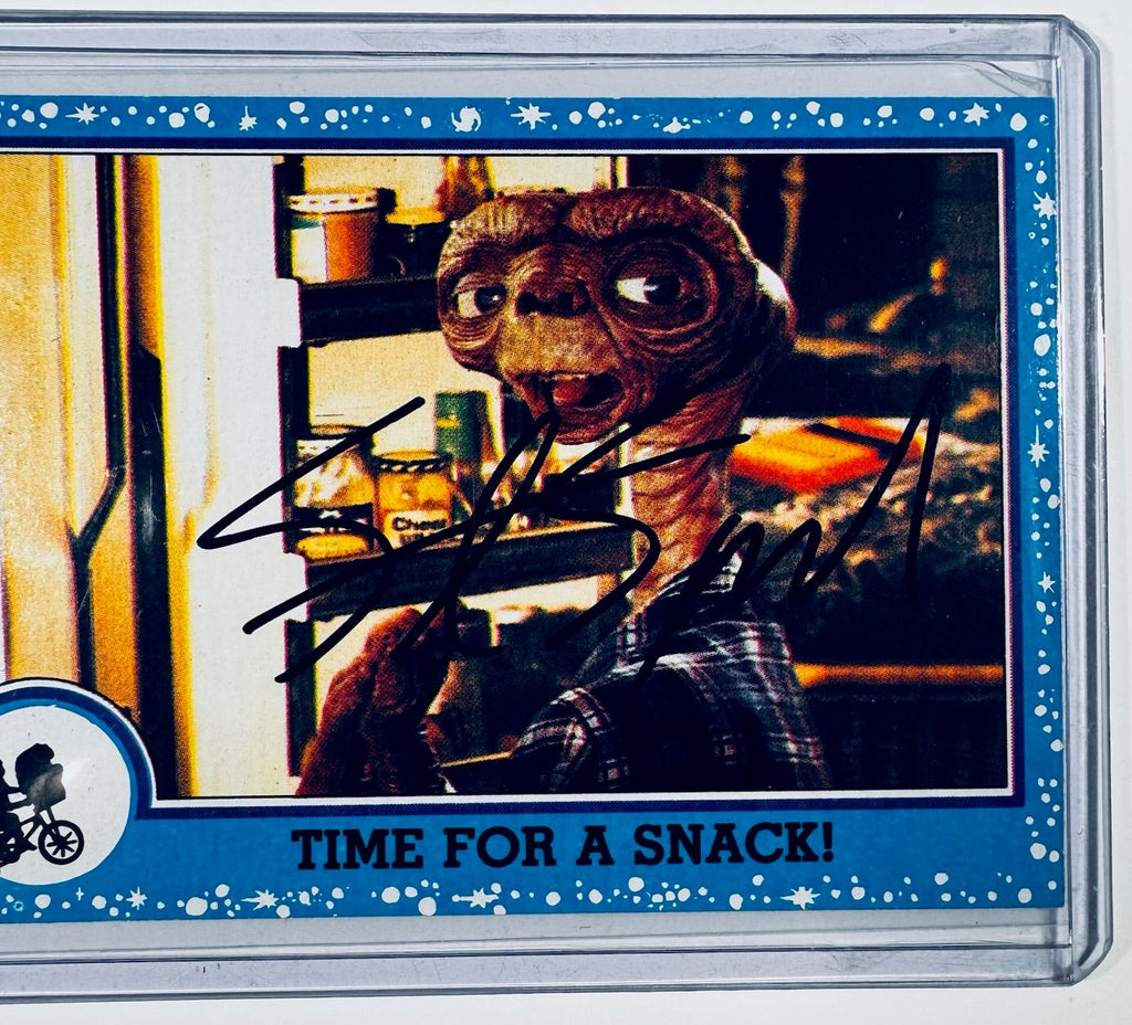 Closeup of Steven Spielberg autograph on vintage E.T. trading card