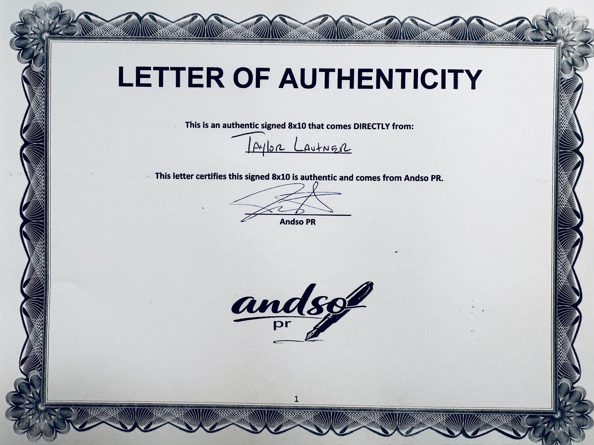 A Letter of Authenticity with a decorative blue-patterned border, certifying an authentic signed 8x10 coming directly from Taylor Lautner, featuring a signature at the top.
