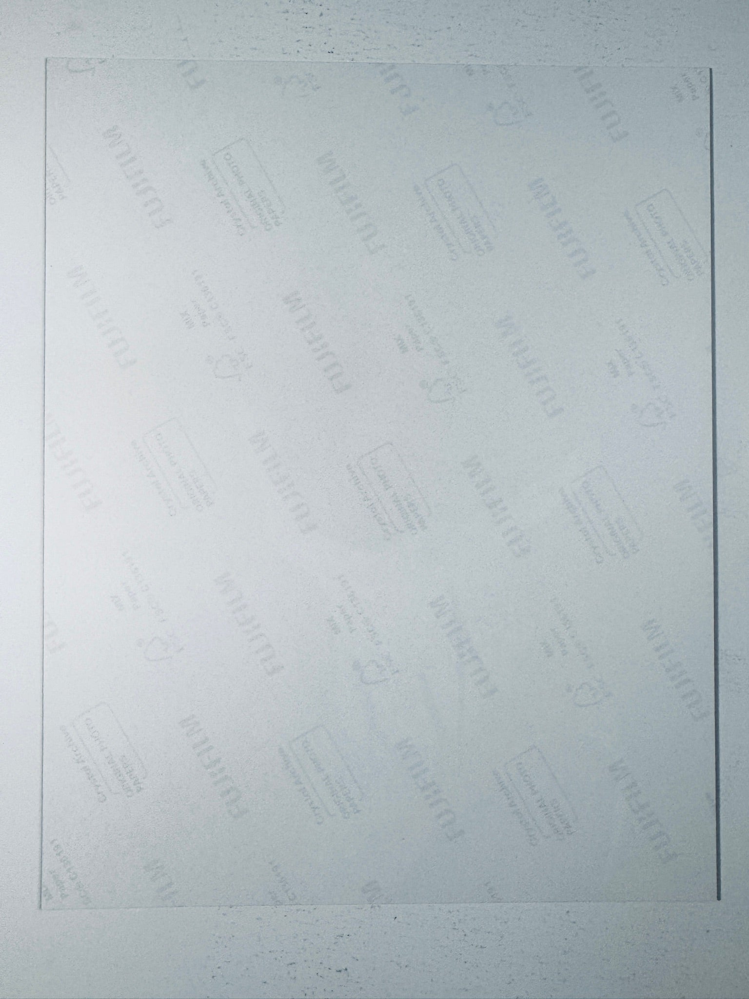 Fujifilm Crystal Archive photographic paper back surface showing the authentic backing and paper texture for the Tiffani Amber Thiessen signed photo.