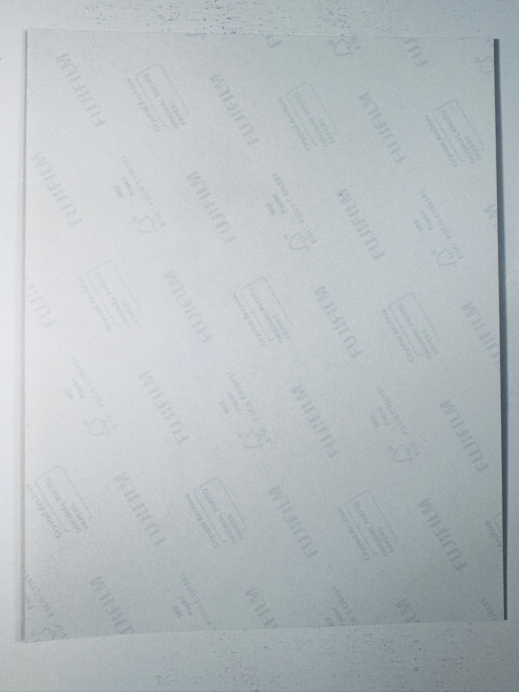 Back of the Fujifilm photographic paper showing the reverse side condition and paper branding for the Tom Hanks signed Toy Story collectible.