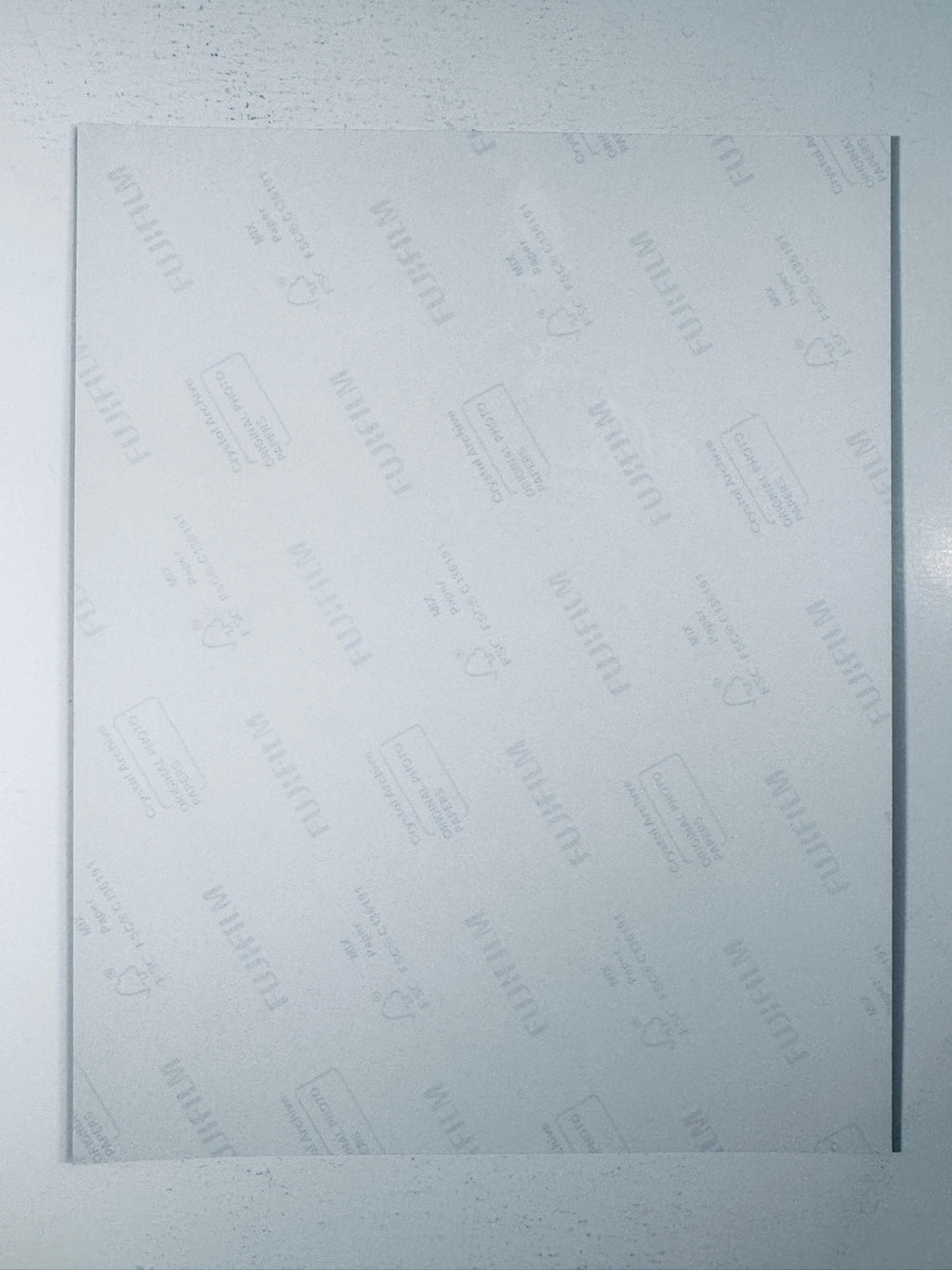 Back of the Fujifilm photographic paper showing the reverse side condition and paper branding for the Tom Hardy signed The Dark Knight Rises collectible.