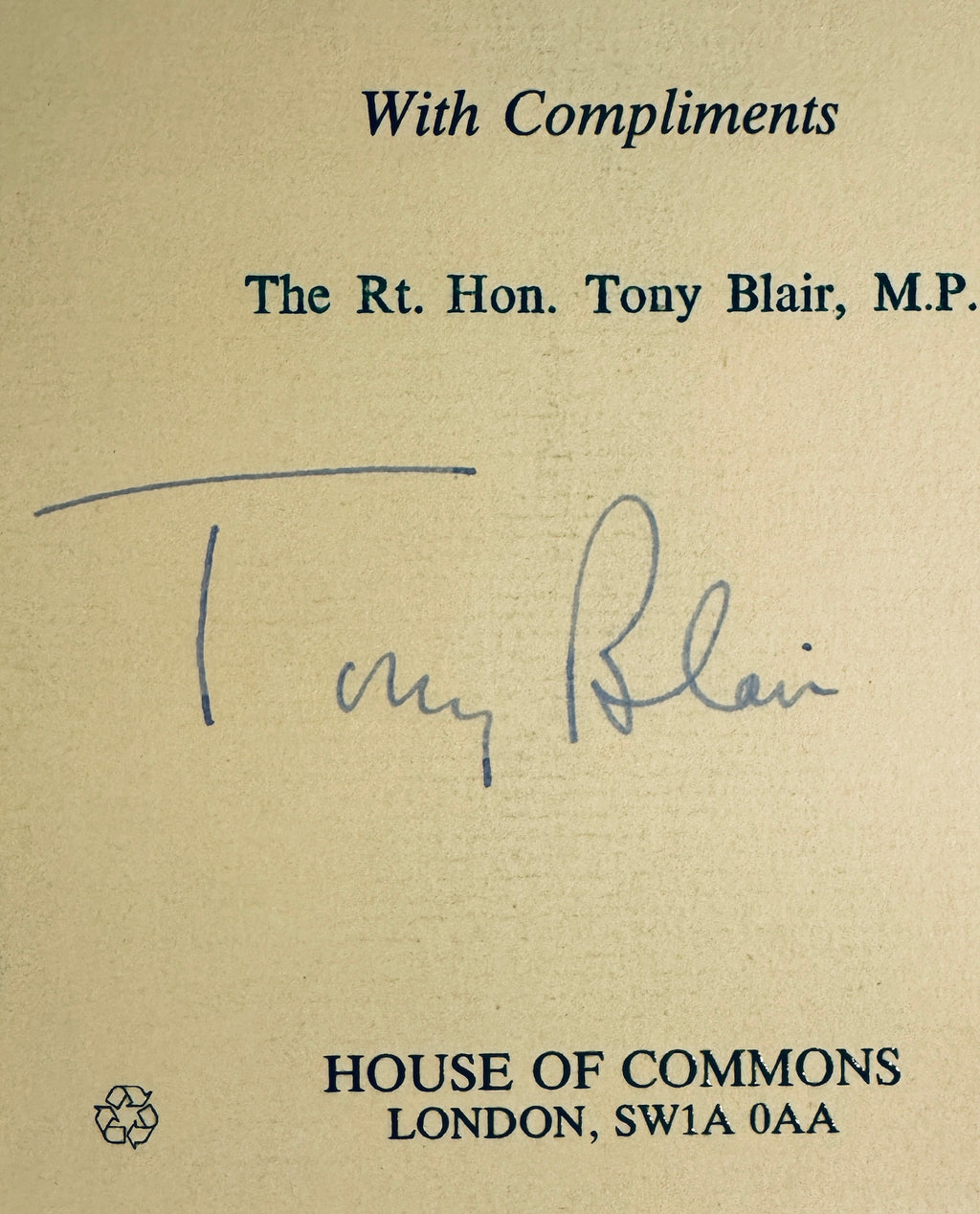 Close-up view of Tony Blair signature in blue pen on official House of Commons stationery.